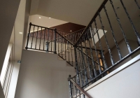 Staircase with brass handrail ONE