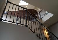 Staircase with brass handrail two